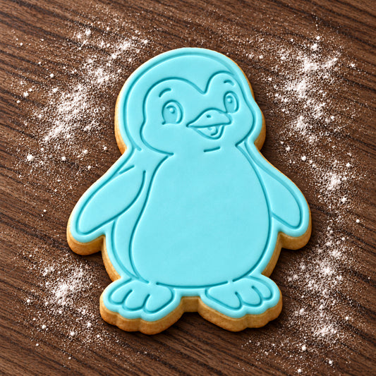 Penguin cookie cutter and embosser set – aqua fondant cookie example