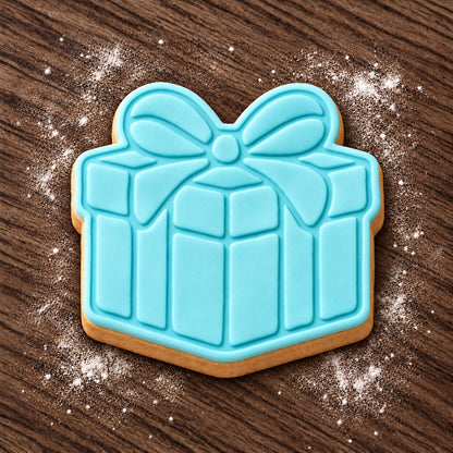 Present decorated fondant cookie