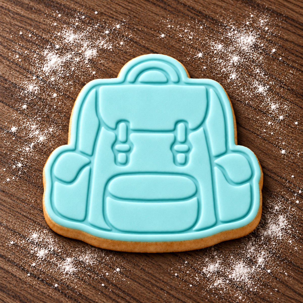 Backpack decorated fondant cookie