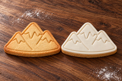 Mountain plain and white fondant cookie examples