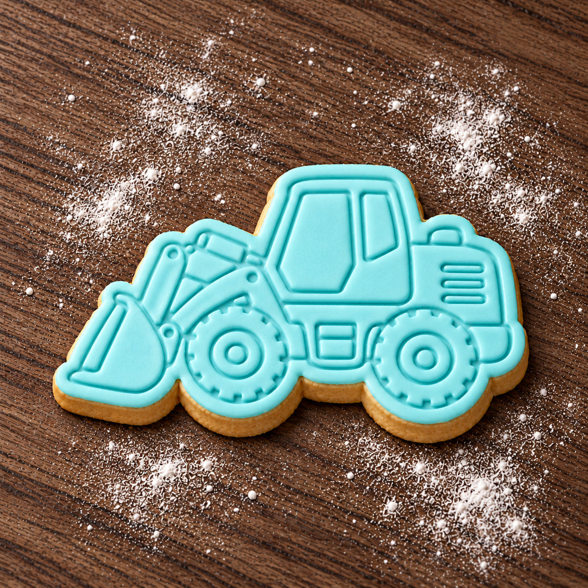 Front Loader decorated fondant cookie