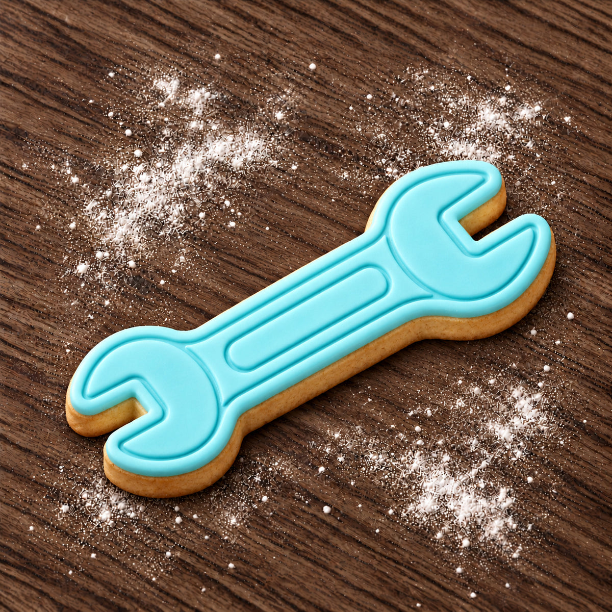 Spanner decorated fondant cookie