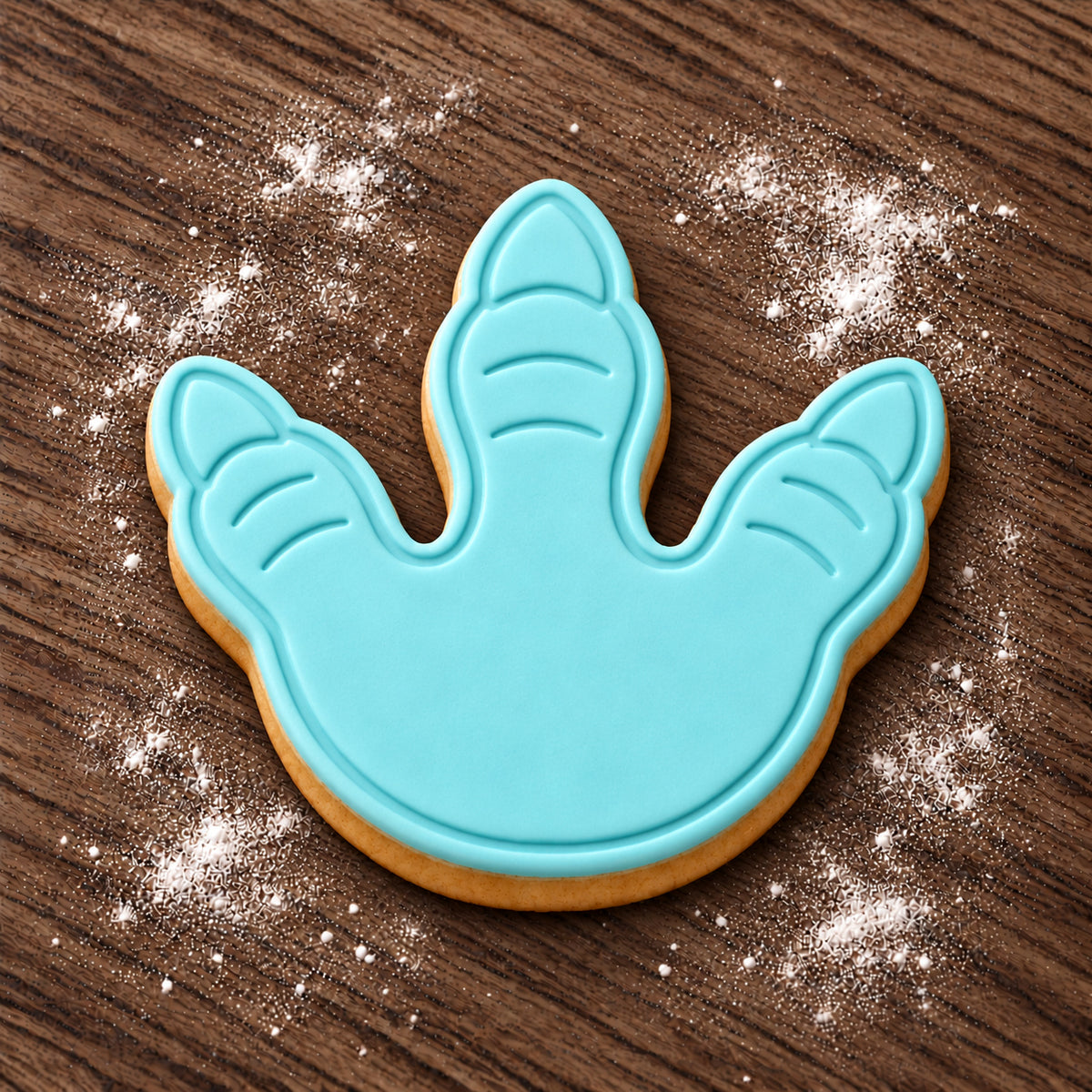 Footprint decorated fondant cookie