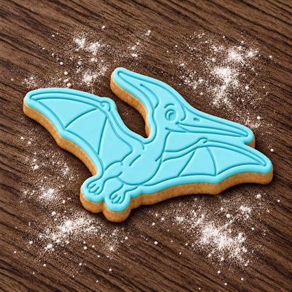 Pteranodon decorated fondant cookie