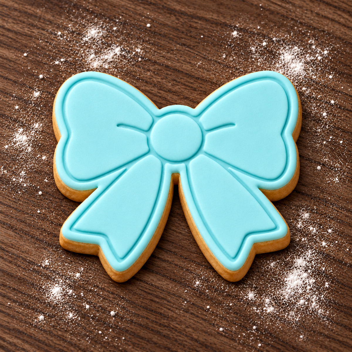 Bow decorated fondant cookie