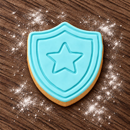 Shield decorated fondant cookie