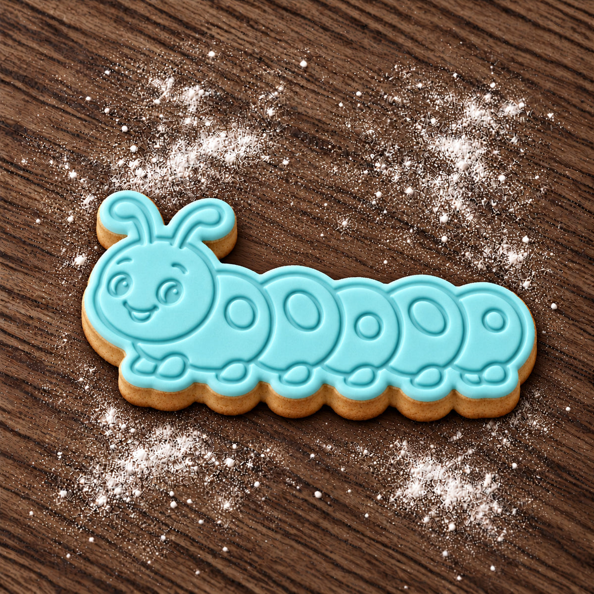 Caterpillar decorated fondant cookie
