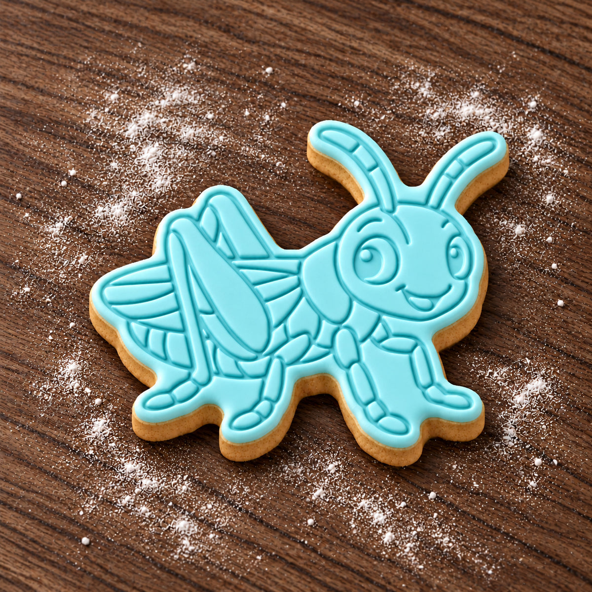 Grasshopper decorated fondant cookie