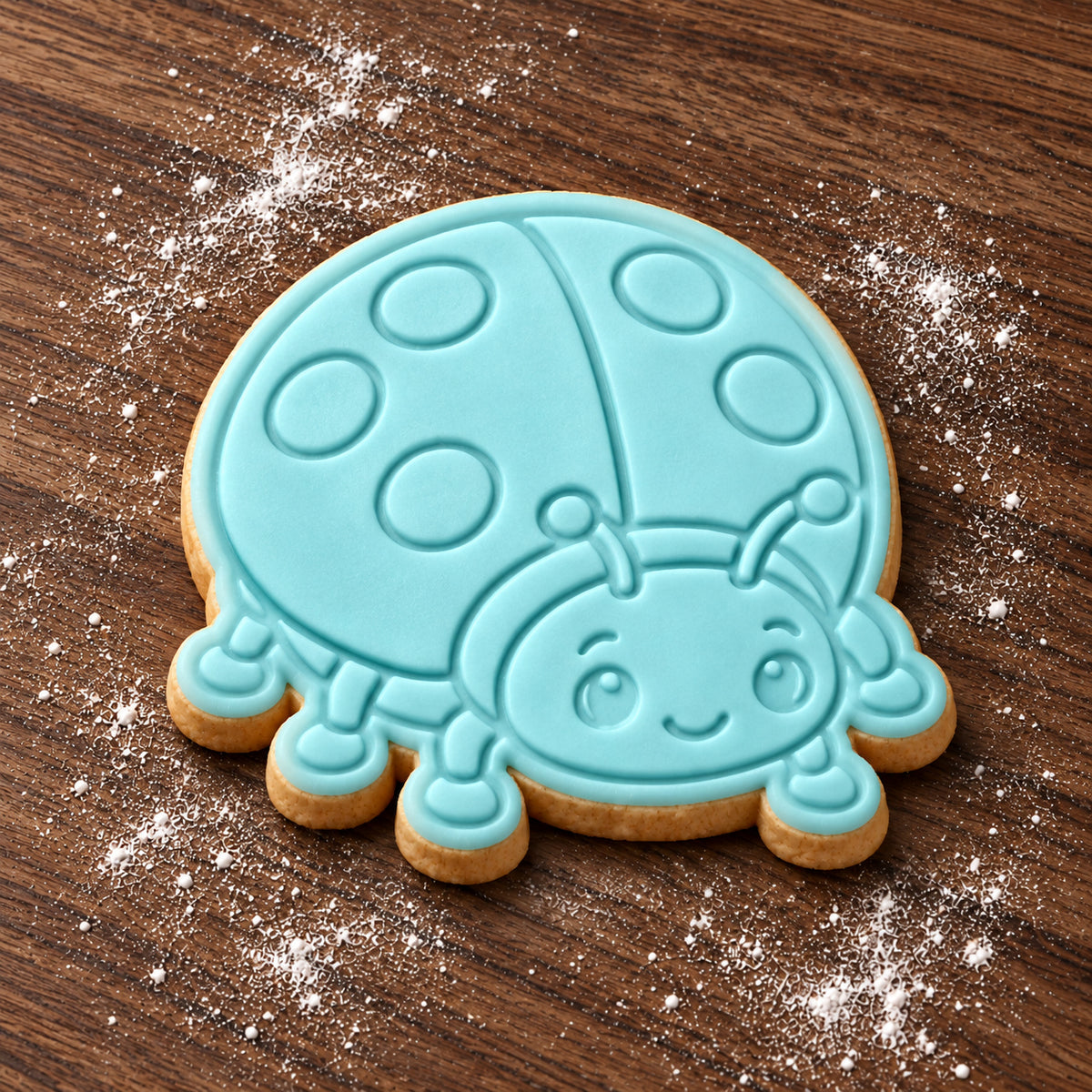 Ladybird decorated fondant cookie