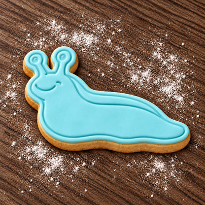 Slug decorated fondant cookie