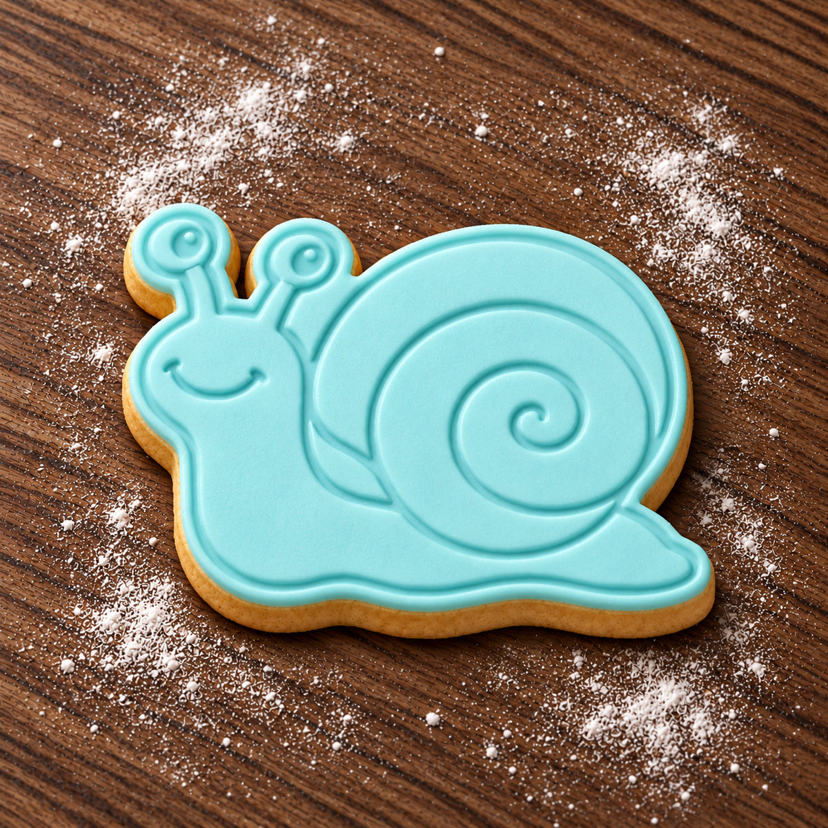 Snail decorated fondant cookie