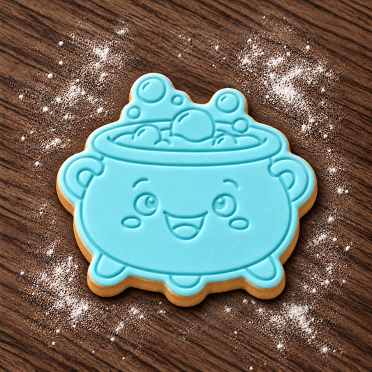 Cauldron decorated fondant cookie