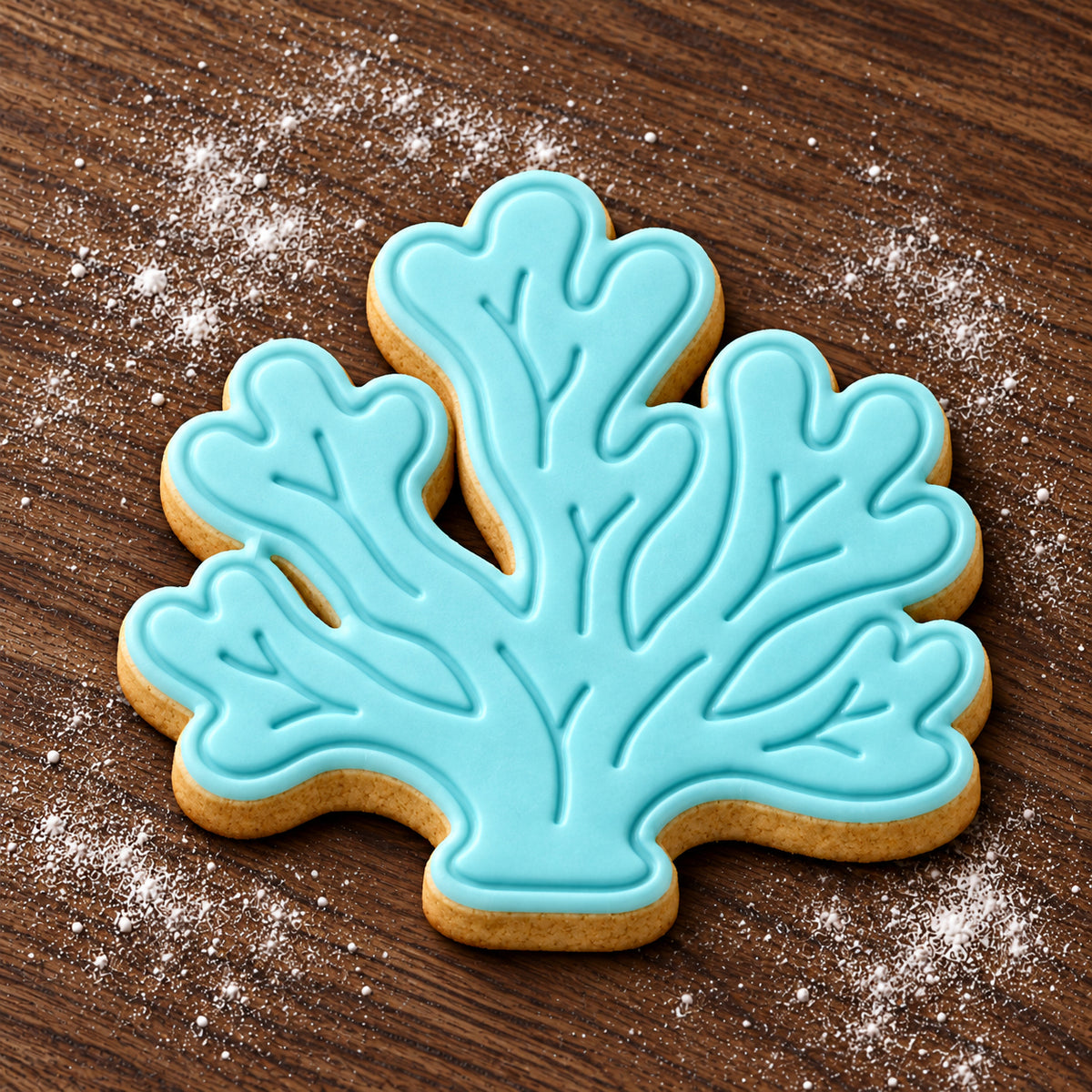 Coral decorated fondant cookie