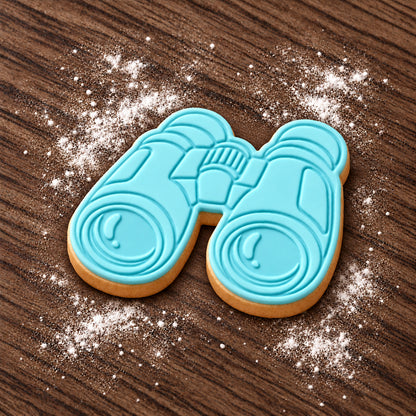 Binoculars decorated fondant cookie