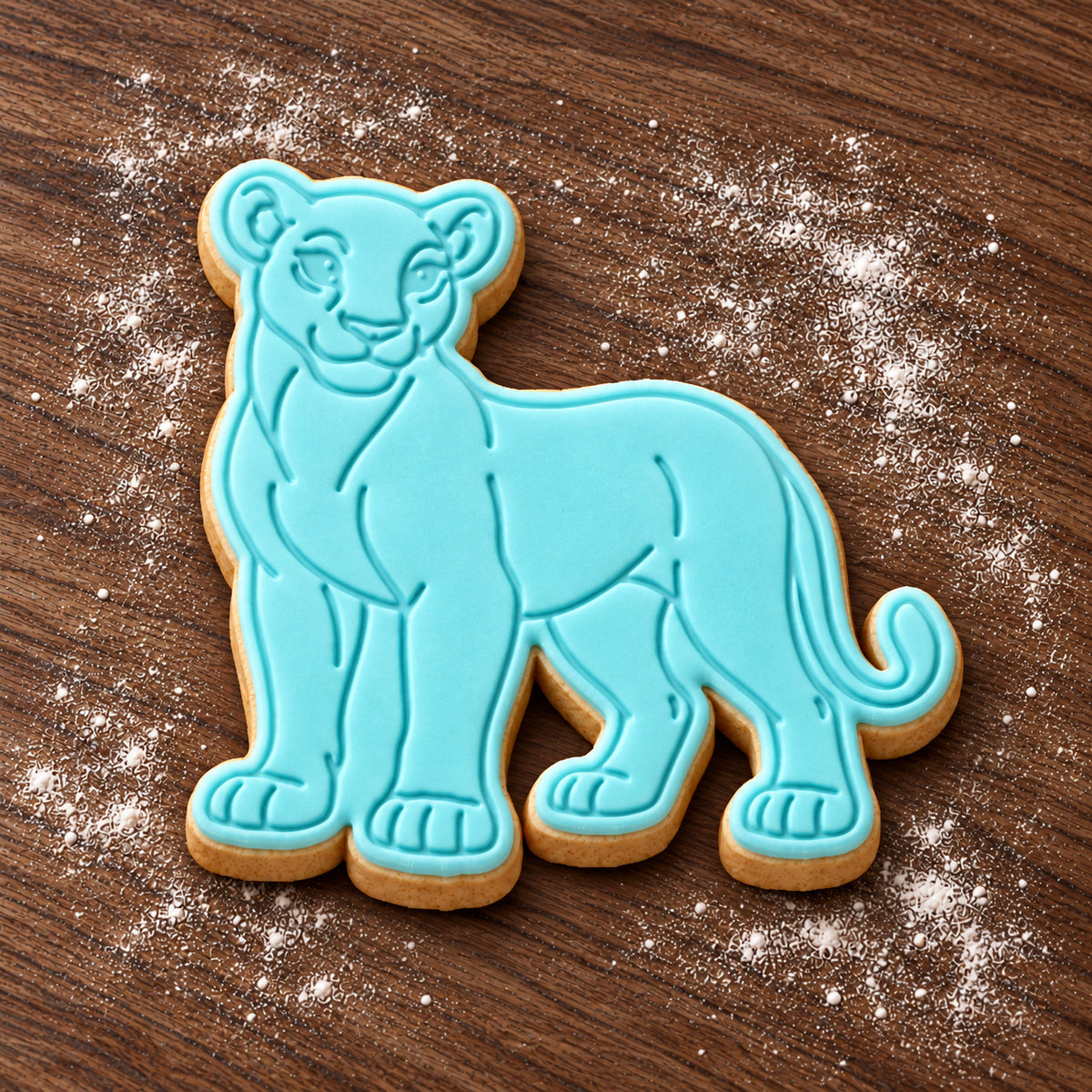 Lioness decorated fondant cookie
