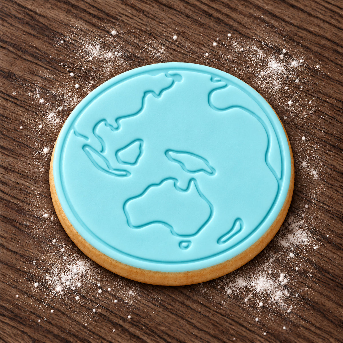 Earth decorated fondant cookie