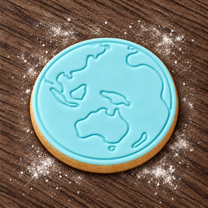 Earth decorated fondant cookie