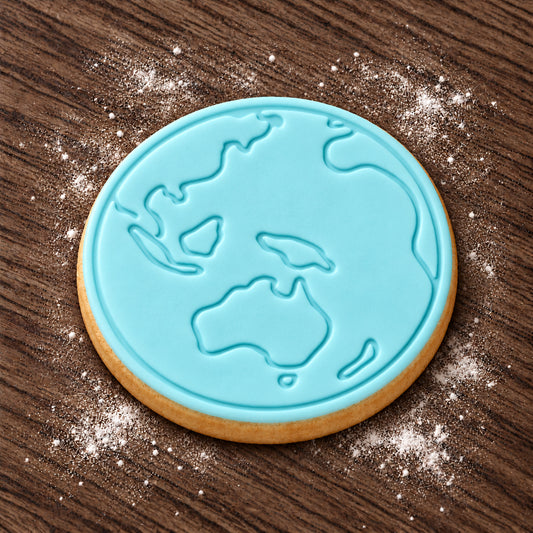 Earth decorated fondant cookie
