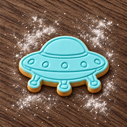 UFO decorated fondant cookie