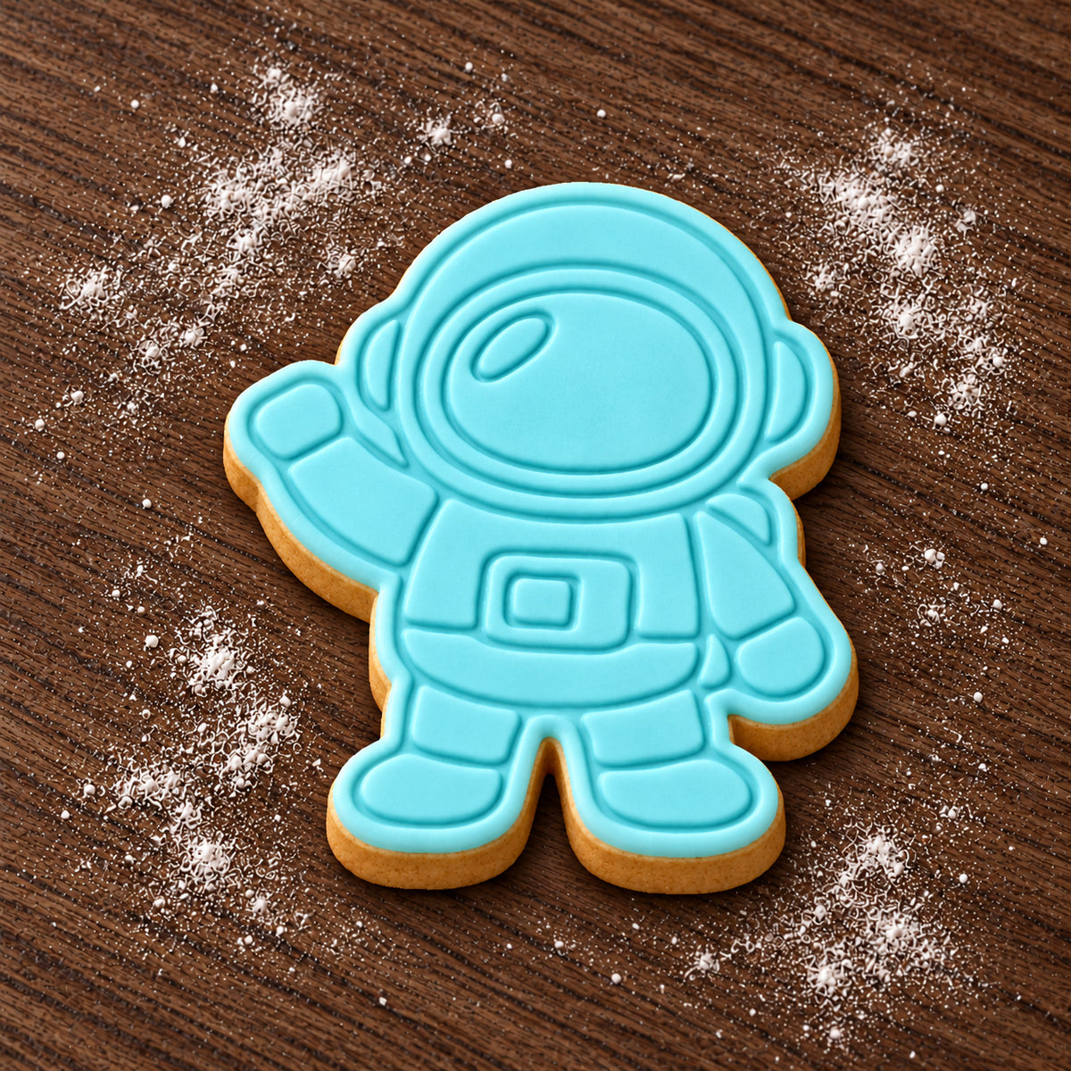 Astronaut decorated fondant cookie