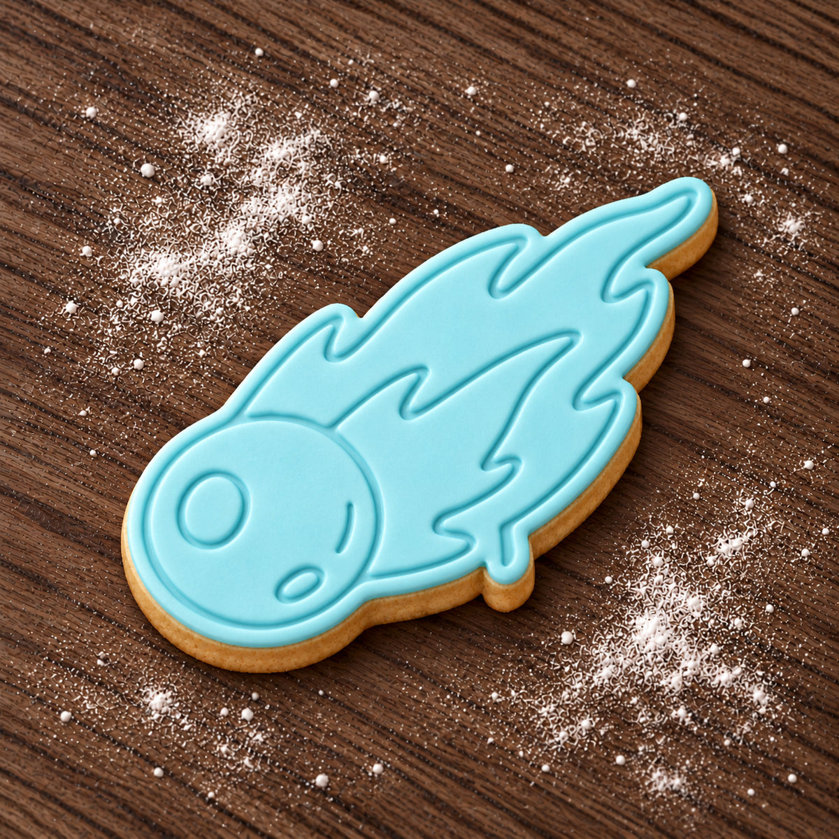 Comet decorated fondant cookie