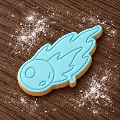 Comet decorated fondant cookie