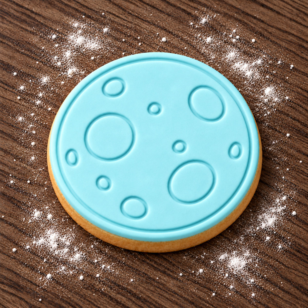 Moon decorated fondant cookie