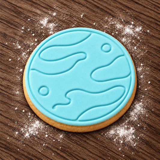 Planet decorated fondant cookie