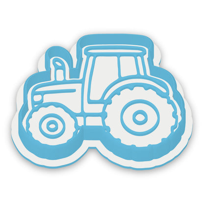 Tractor assembled cutter and embosser