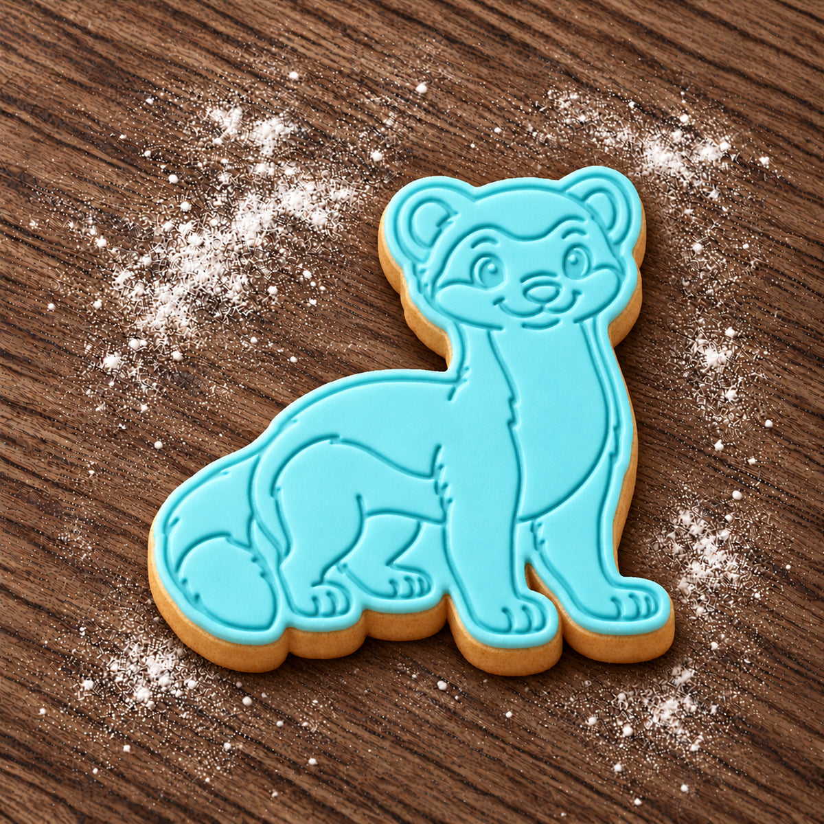 Weasel decorated fondant cookie