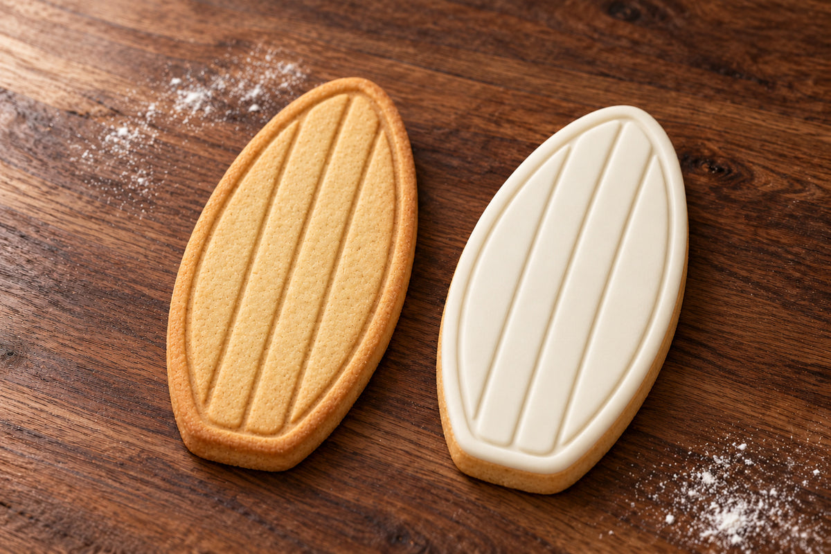 Surfboard cookie cutter and embosser set – plain cookie and white fondant cookie examples