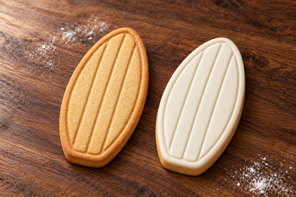 Surfboard cookie cutter and embosser set – plain cookie and white fondant cookie examples
